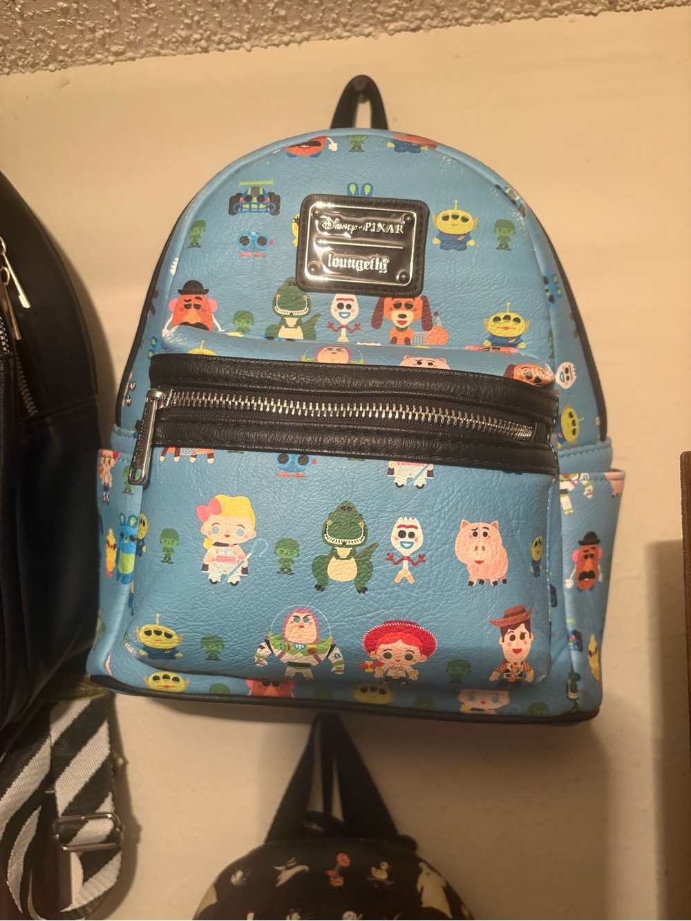 Loungefly Light Blue Toy Story Character Mini Backpack